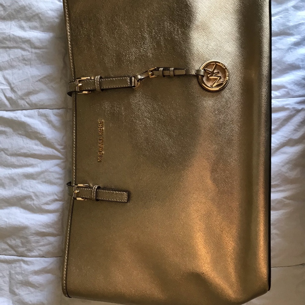 Gold Michael Kors tote with laptop middle divider